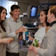 Boston General guests enjoy signature cocktails while mingling with a patient recovering from surgery.